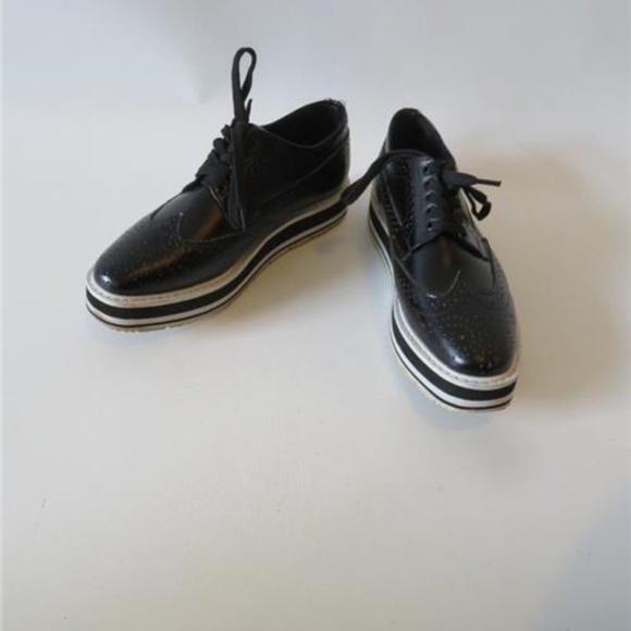 prada wingtip leather platform brogues
